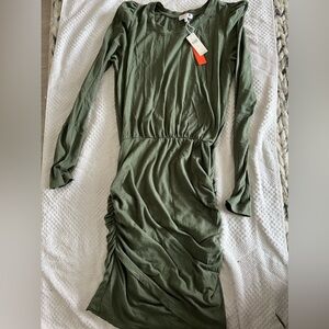 Anthropologie dress in moss green size medium